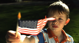 kid waving flag